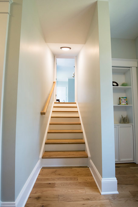 Stairs leading to the new laundry room.