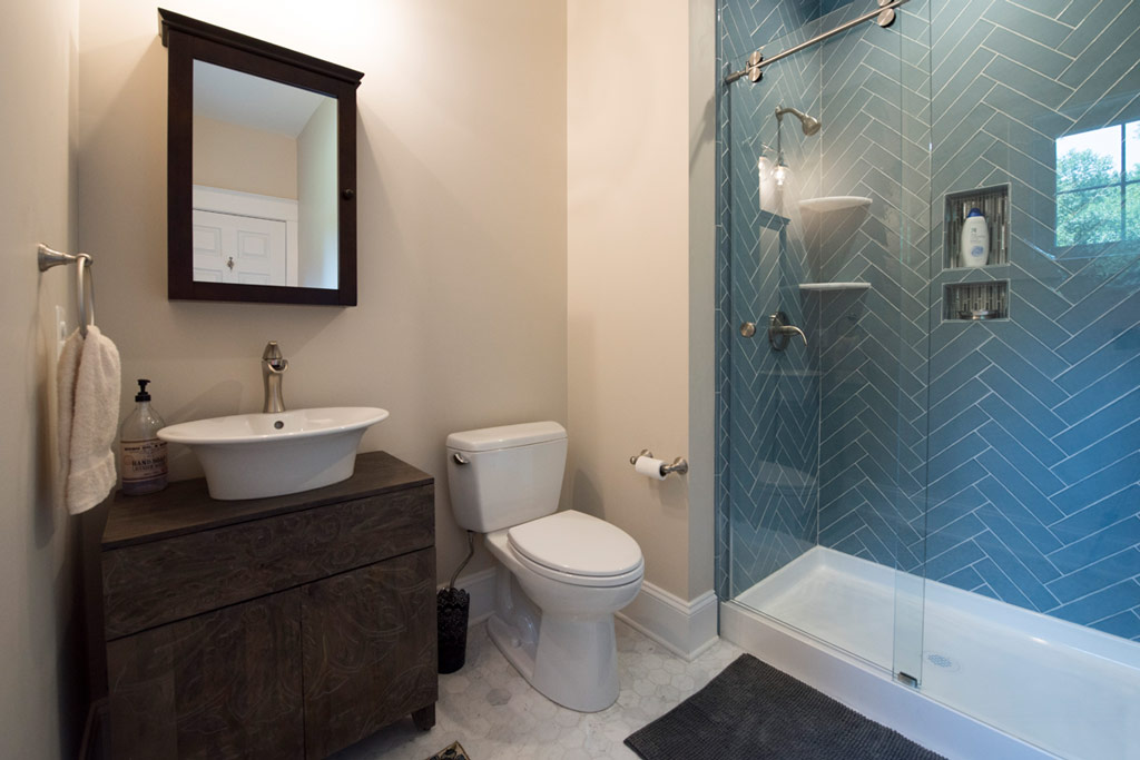 A view of the shower and tile work.