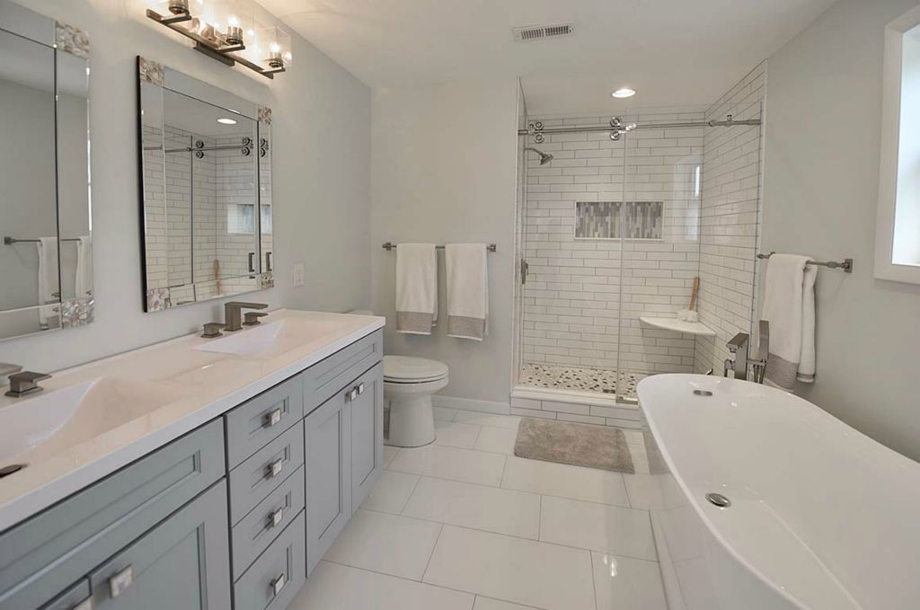 New bathroom with space for double sink vanity and slipper soaking tub.