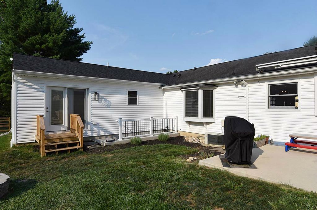 Exterior view of the master bedroom addition. Note the new location of the basement Bilco egress window.