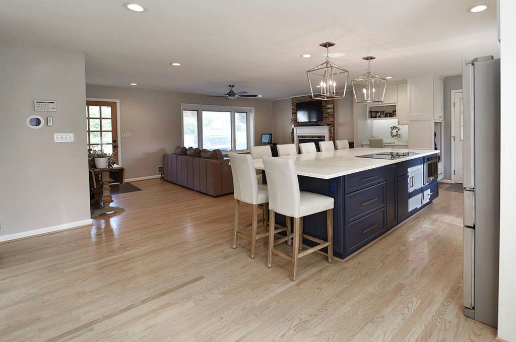 Removing walls and reinforcing the ceiling trusses created a spacious, open concept living and dining area.