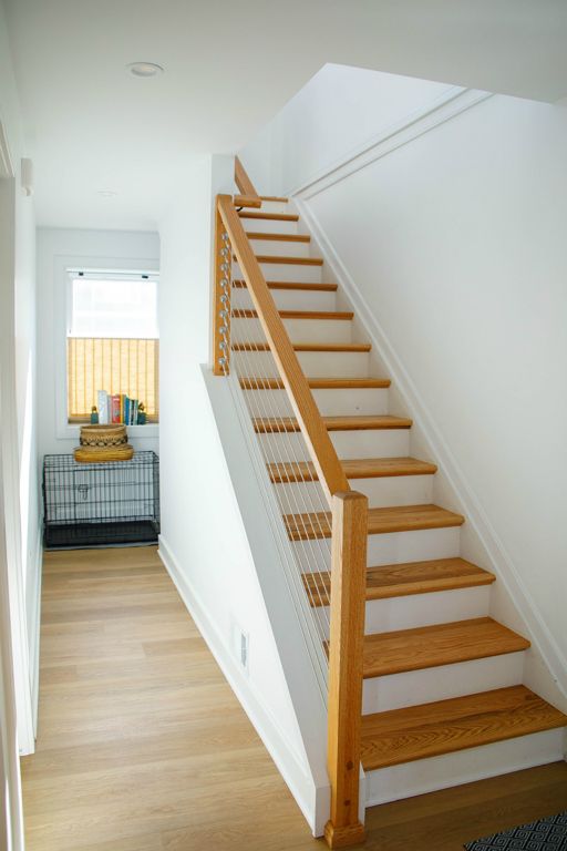 Custom designed stairway to the second floor.